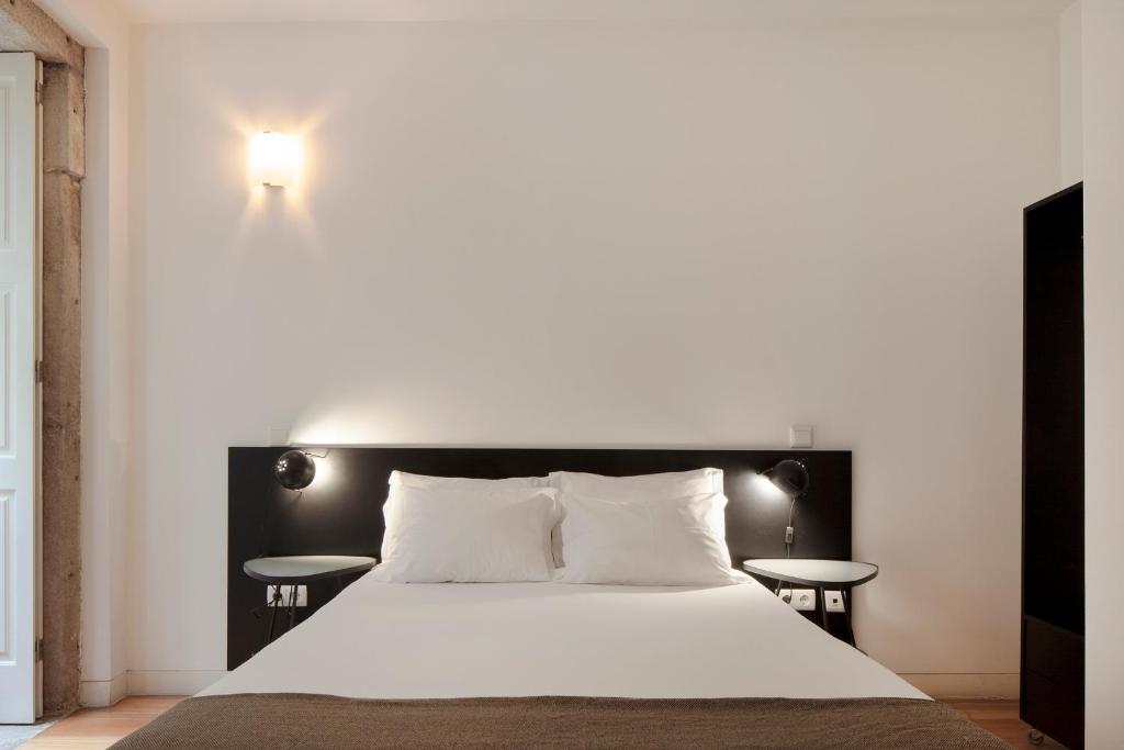 Postel nebo postele na pokoji v ubytování Cale Guest House