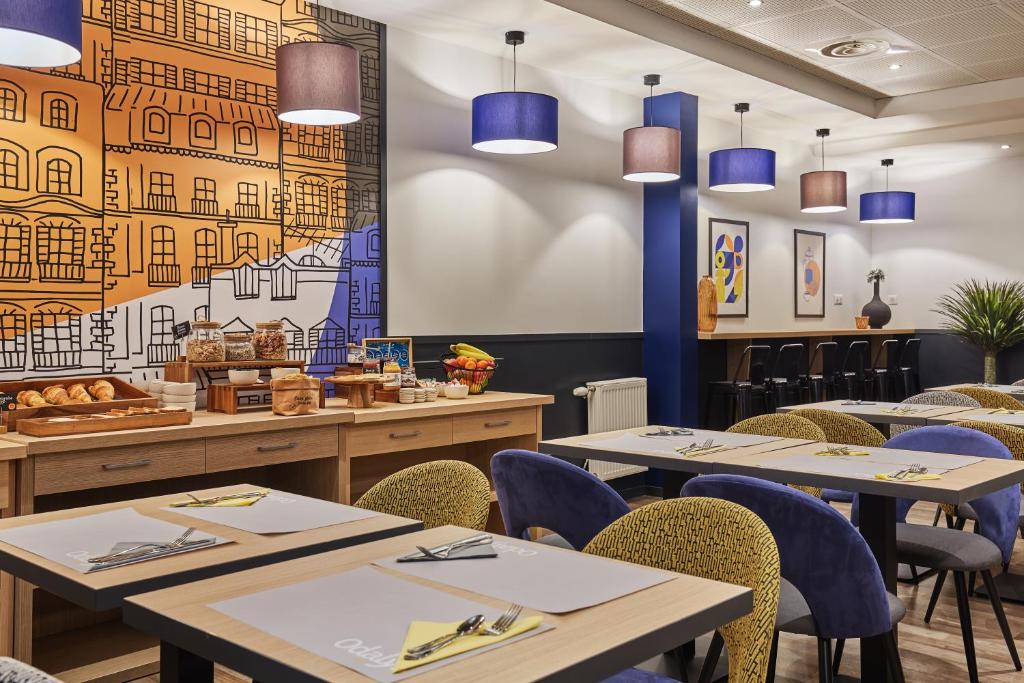 Appart Hotel Odalys City Paris Levalloisにあるレストランまたは飲食店