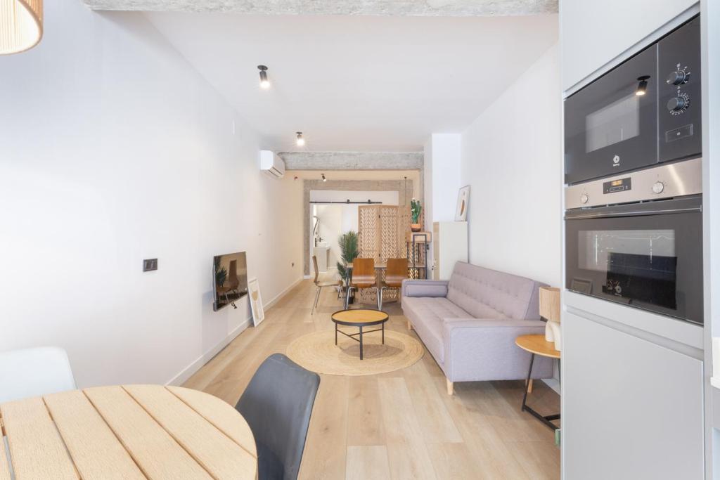 Kuchyň nebo kuchyňský kout v ubytování Turía Flats by Nomad Host