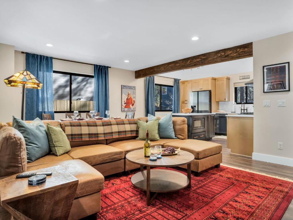 a living room with a couch and a table at 4BD Home - Games - Close to Downtown & Snowbowl in Flagstaff