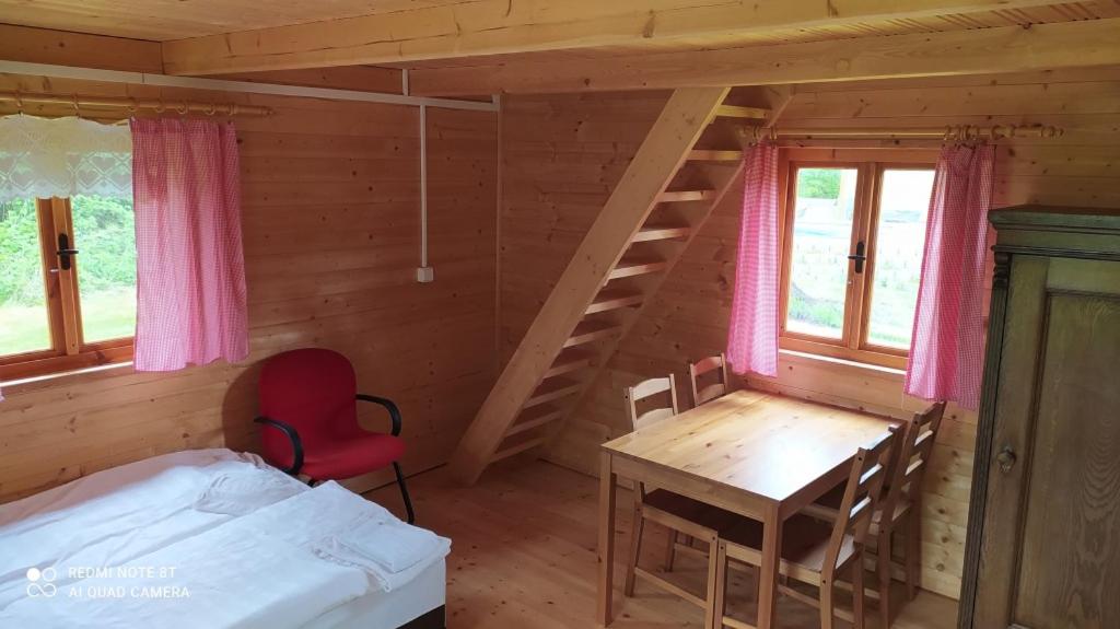 Postel nebo postele na pokoji v ubytování Penzion Slunečno