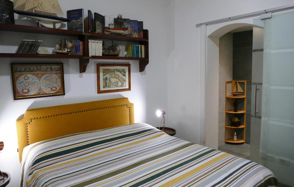 Postel nebo postele na pokoji v ubytování Tosti 79