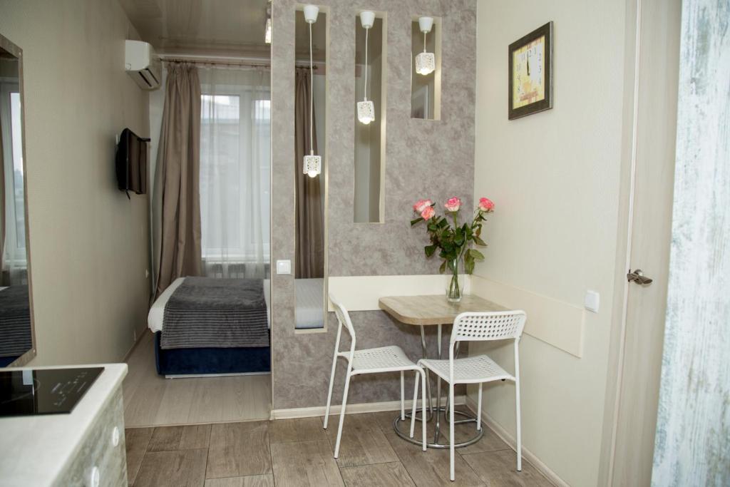 Postel nebo postele na pokoji v ubytování Sumskaya ApartHotel