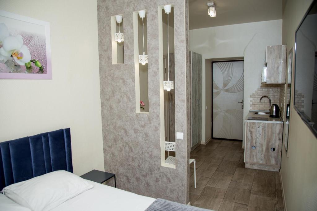 Kuchyň nebo kuchyňský kout v ubytování Sumskaya ApartHotel