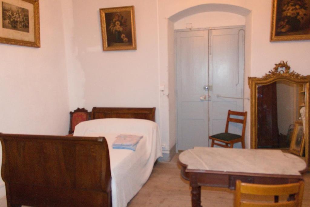 Ένα ή περισσότερα κρεβάτια σε δωμάτιο στο Appartement Vezzani Centre Corse