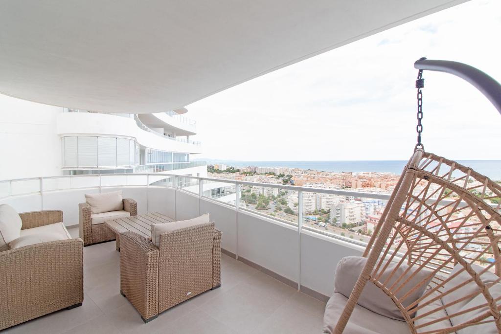 Istumisnurk majutusasutuses Global Properties, Apartamento con vistas al mar, 2 terrazas y piscina en Canet d'en Berenguer