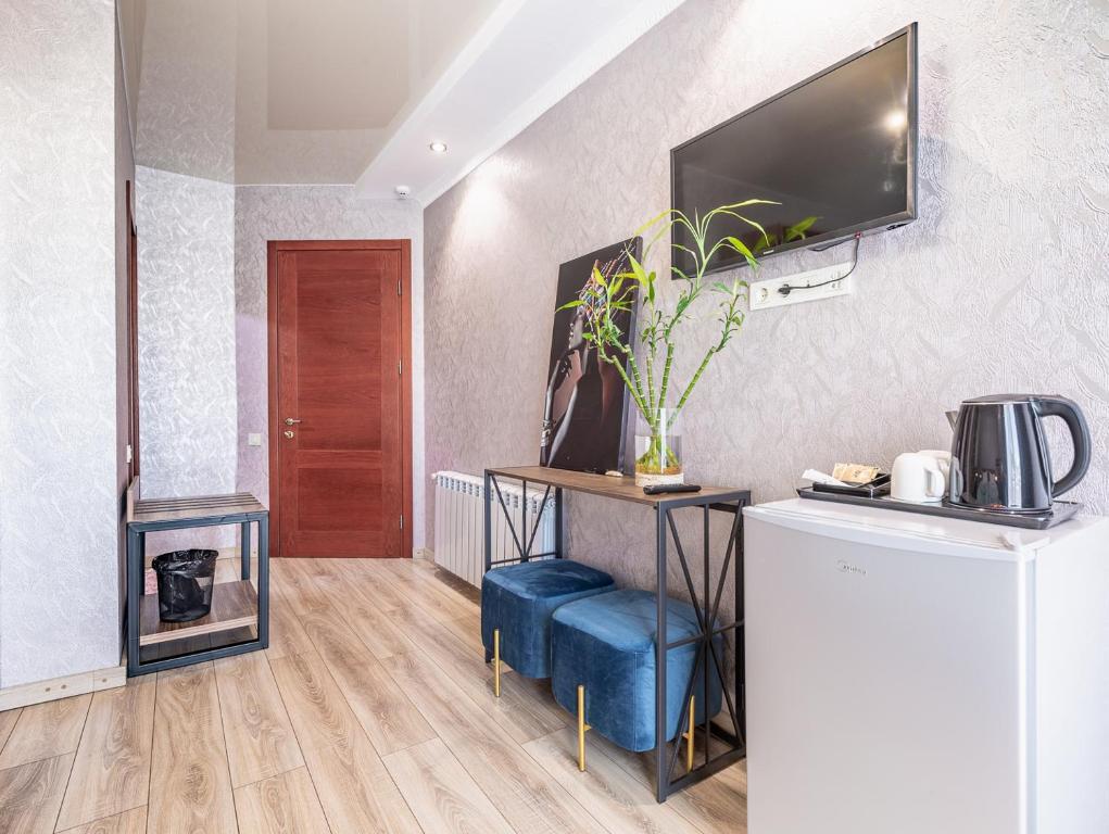 TV a/nebo společenská místnost v ubytování Hotel Gold Tower