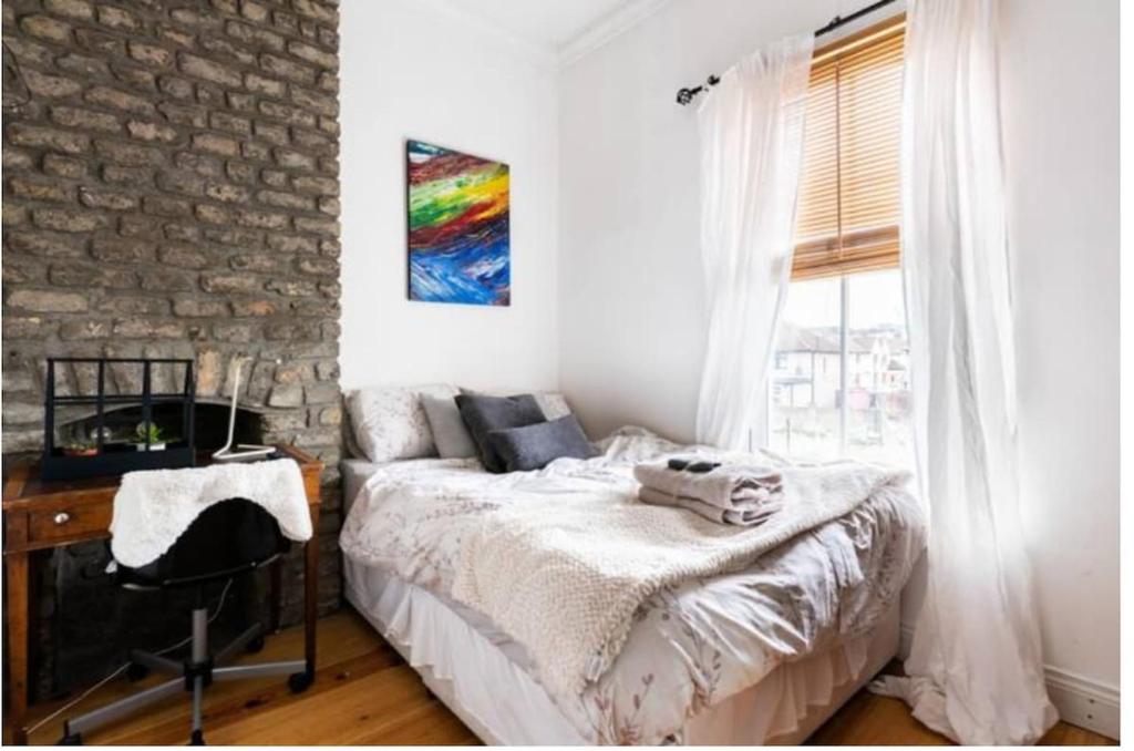 Postel nebo postele na pokoji v ubytování Serres’ Home