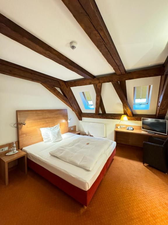 Postel nebo postele na pokoji v ubytování Hotel Haimerlhof