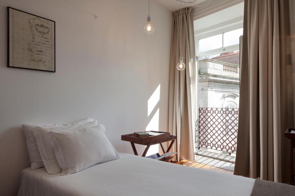 Postel nebo postele na pokoji v ubytování Cale Guest House