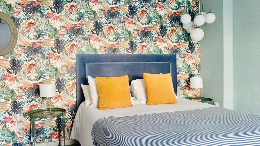 Posteľ alebo postele v izbe v ubytovaní Loft Playa Suite Málaga