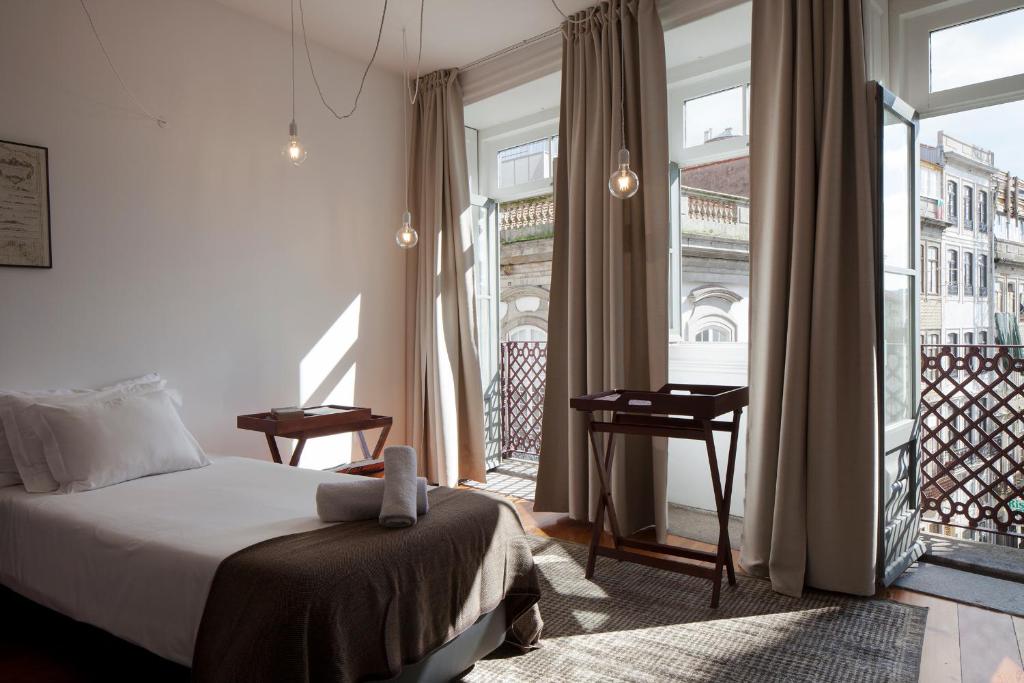 Postel nebo postele na pokoji v ubytování Cale Guest House