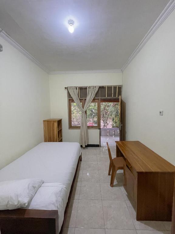 Postel nebo postele na pokoji v ubytování dAlvin Multiple Stays