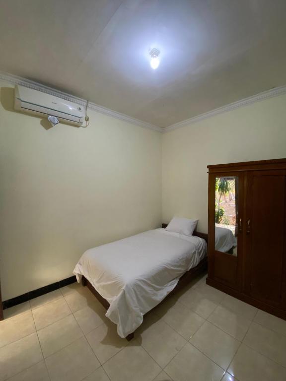 Postel nebo postele na pokoji v ubytování dAlvin Multiple Stays