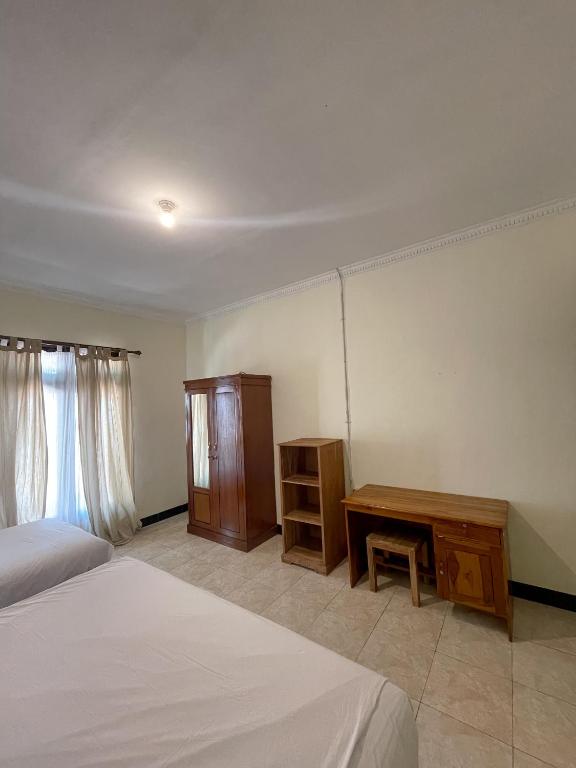 Postel nebo postele na pokoji v ubytování dAlvin Multiple Stays