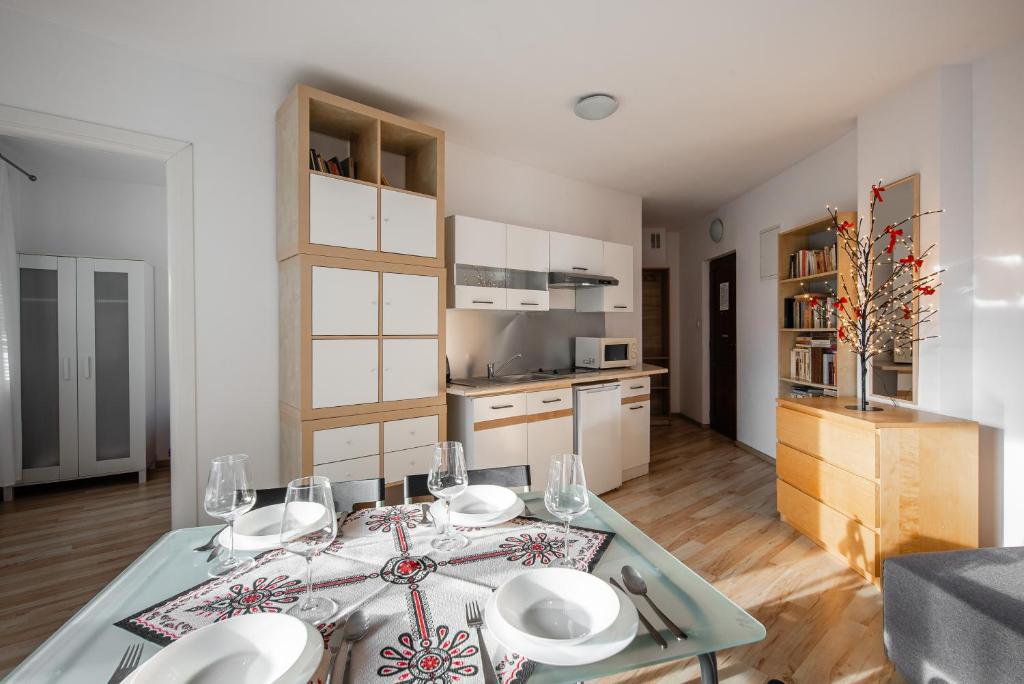 Kuchyňa alebo kuchynka v ubytovaní Apartamenty Smrekowa Zakopane