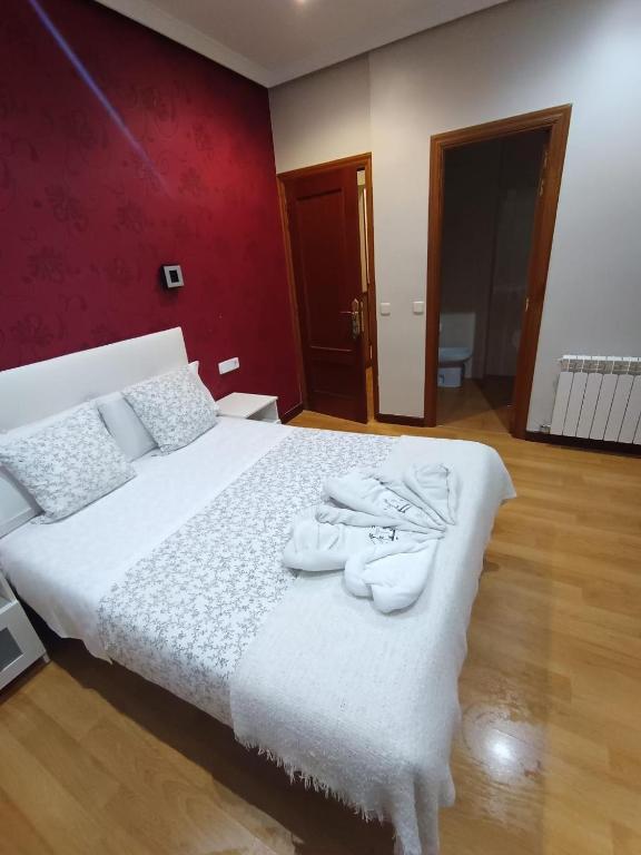 Postel nebo postele na pokoji v ubytování Hostal New Dream Madrid