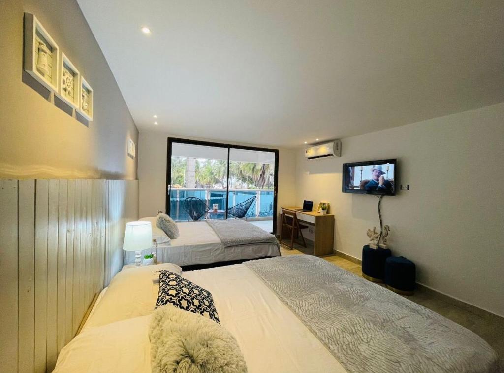 Postel nebo postele na pokoji v ubytování Apartamentos Top Hansa Alfrente de la playa