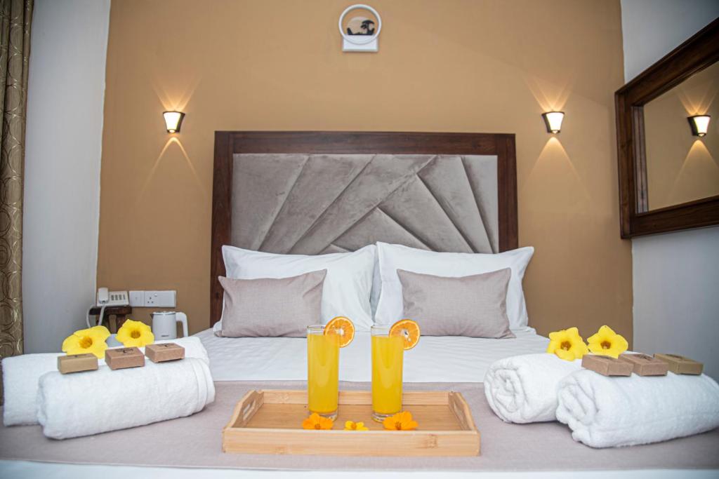 Postel nebo postele na pokoji v ubytování Sky Garden Hotel - KANDY