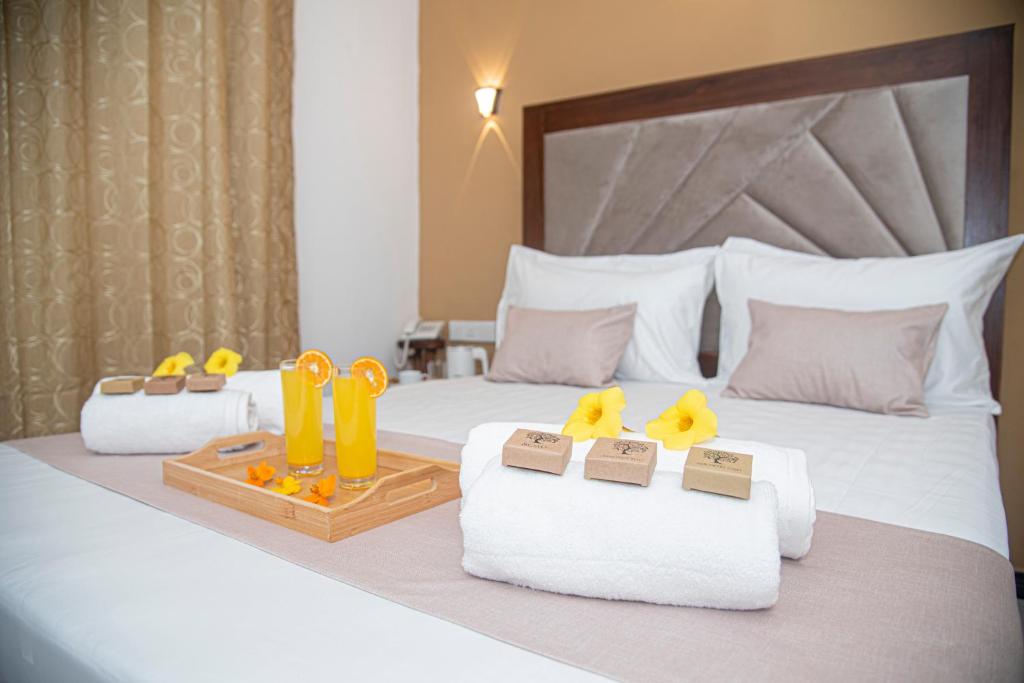Postel nebo postele na pokoji v ubytování Sky Garden Hotel - KANDY
