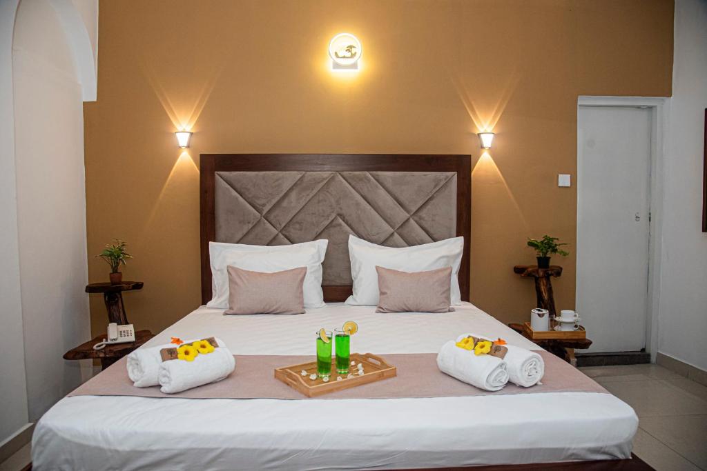 Postel nebo postele na pokoji v ubytování Sky Garden Hotel - KANDY