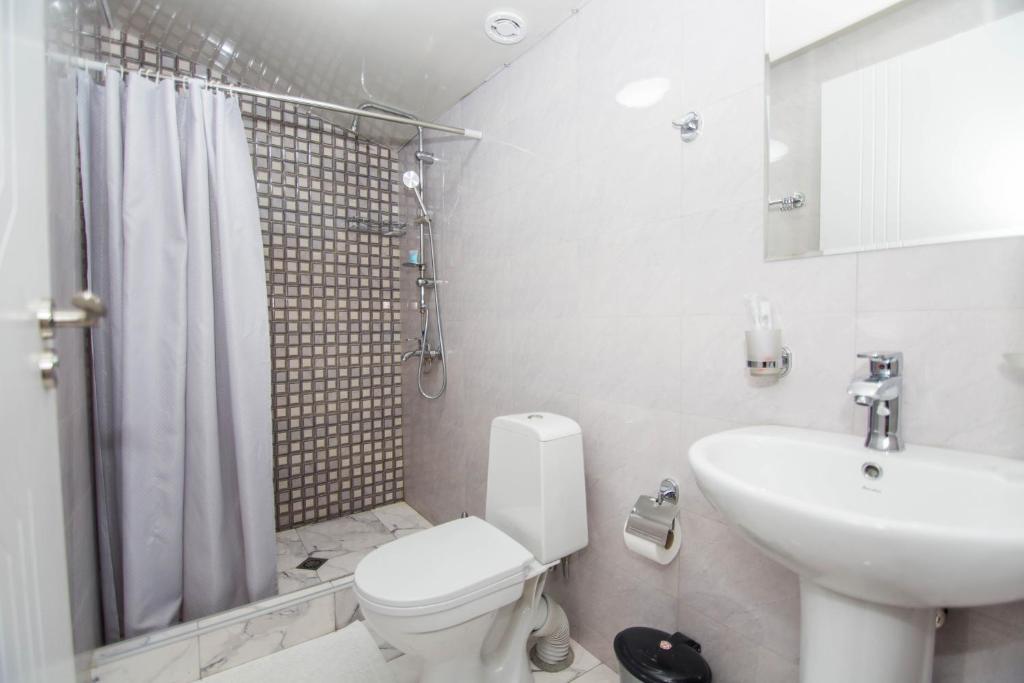 Koupelna v ubytování Hotel Care Inn