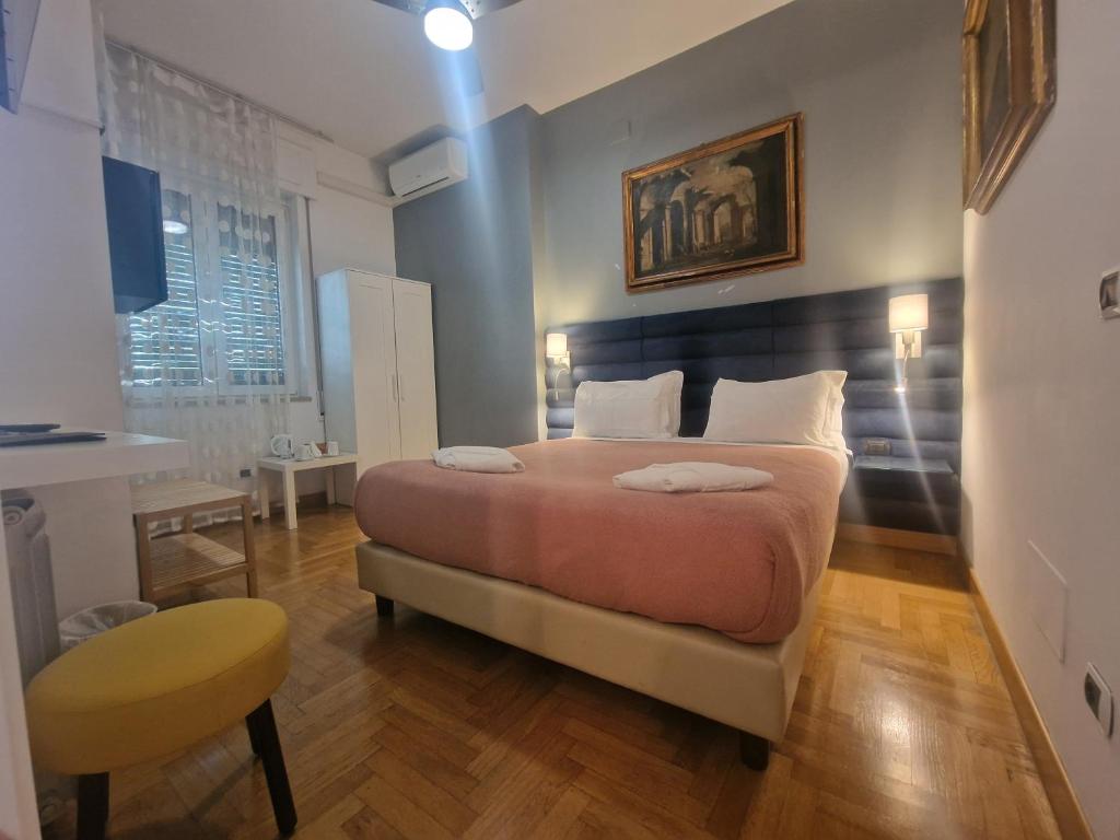 Posteľ alebo postele v izbe v ubytovaní Sweet Home Parioli