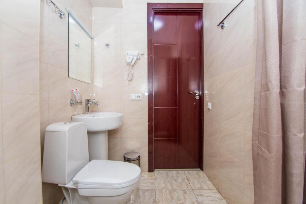 Koupelna v ubytování Hotel Care Inn