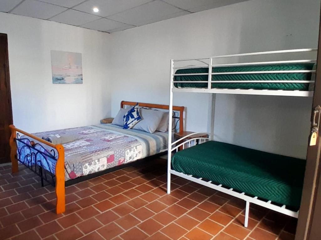 Postel nebo postele na pokoji v ubytování Casa Blanca