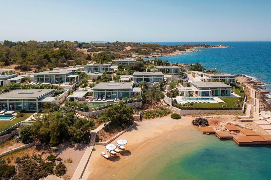 an aerial view of a resort on the beach at One&Only Aesthesis, Athens in Athens