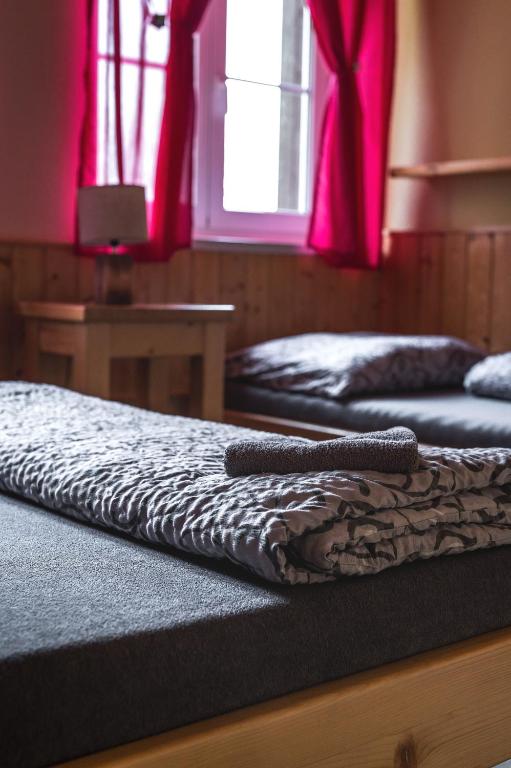Postel nebo postele na pokoji v ubytování Chata Skalka
