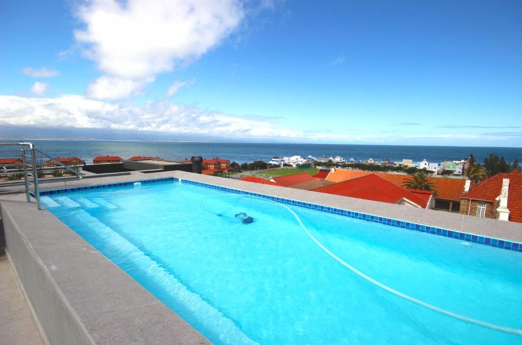 a large swimming pool on top of a building at 202 Mossel Cove in Mossel Bay