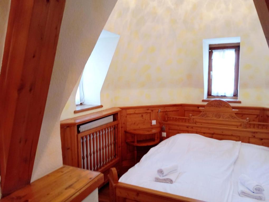 Postel nebo postele na pokoji v ubytování Eichen Schlössl