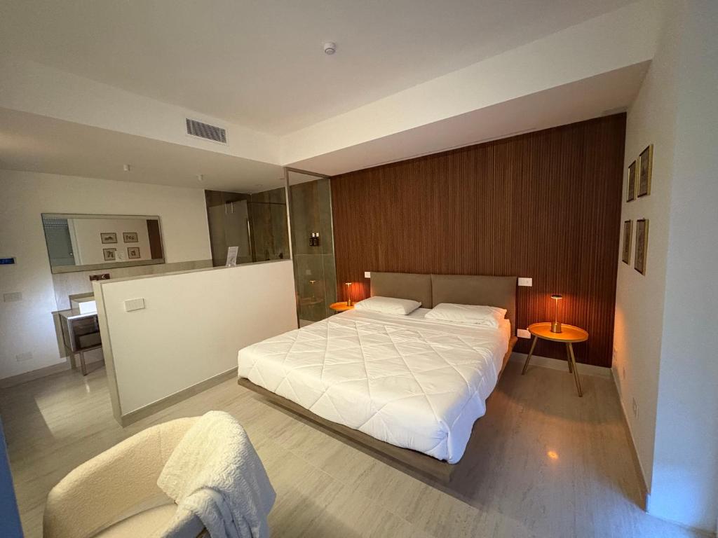 Postel nebo postele na pokoji v ubytování Ram7 Lux Charmant Apartment Gallarate