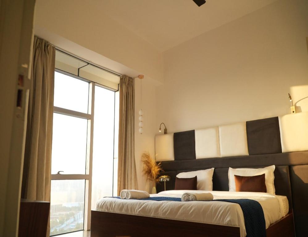 Postel nebo postele na pokoji v ubytování Hotel Nimantrana