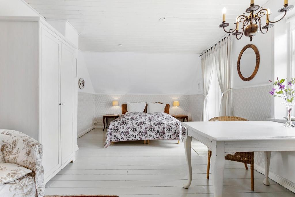 Postel nebo postele na pokoji v ubytování Villa Vendel B&B