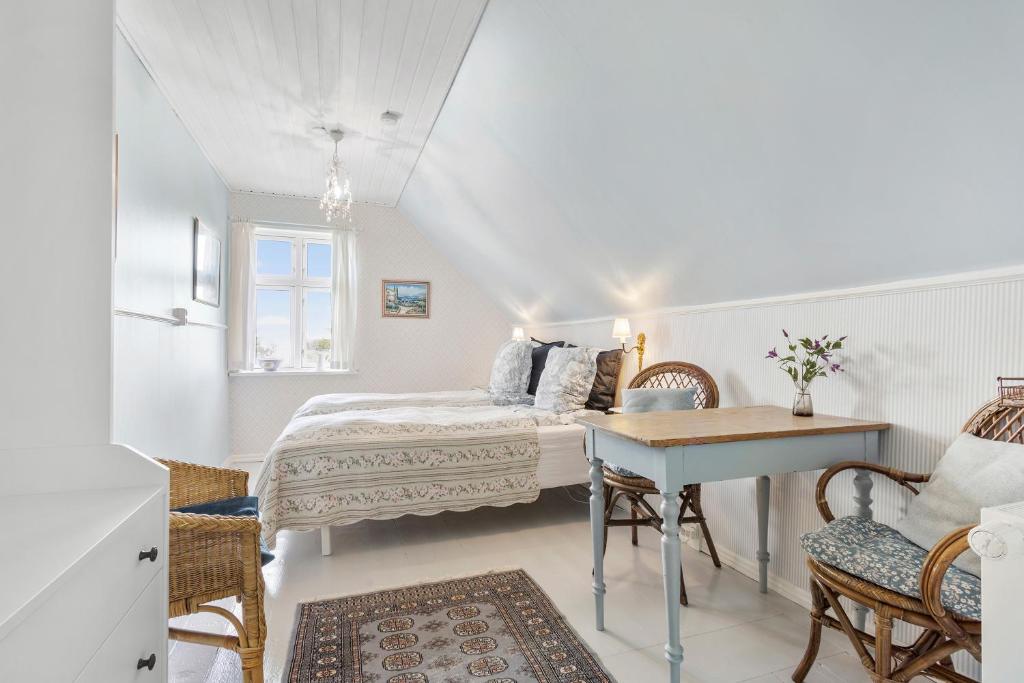 Postel nebo postele na pokoji v ubytování Villa Vendel B&B