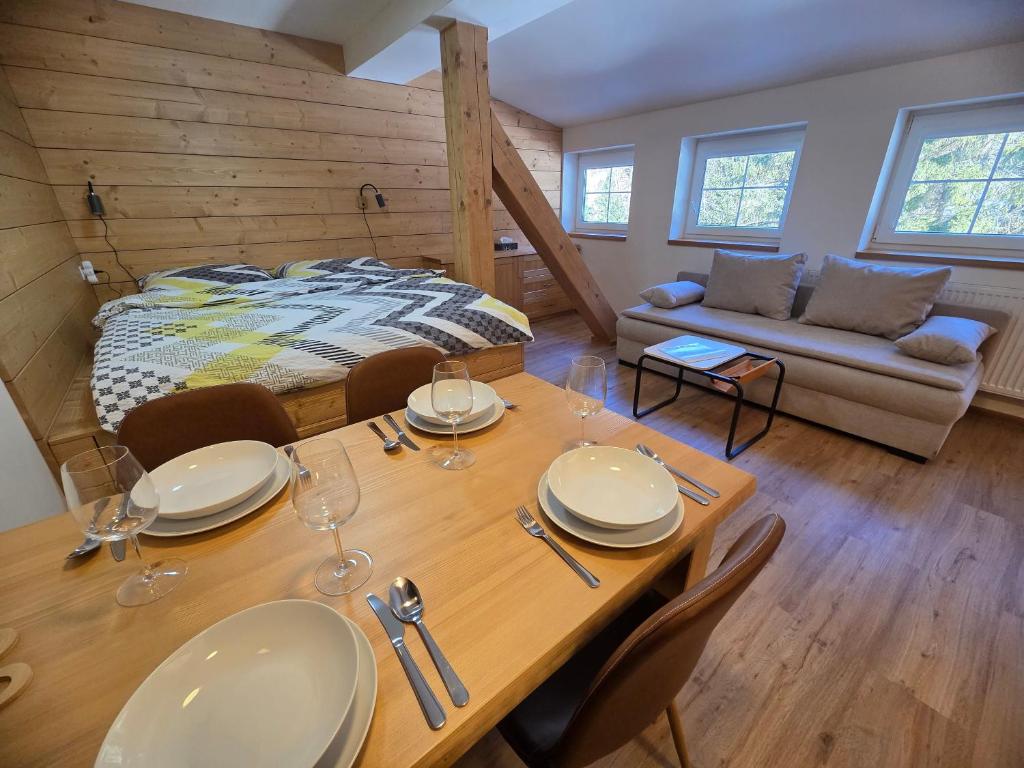 Ένα ή περισσότερα κρεβάτια σε δωμάτιο στο Špindl Lodge Apartments Self check-in & Sauna