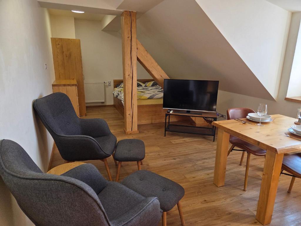 Μια τηλεόραση ή/και κέντρο ψυχαγωγίας στο Špindl Lodge Apartments Self check-in & Sauna