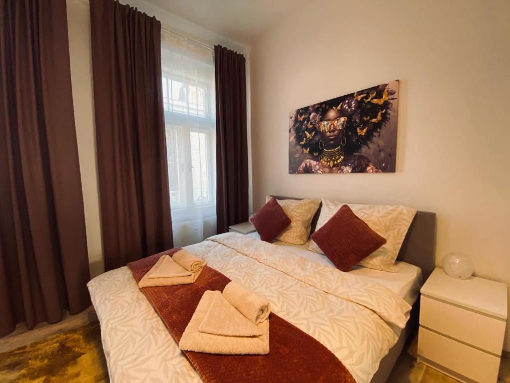 Postel nebo postele na pokoji v ubytování Moderní apartmán vedle divadla - Netflix, Wi-Fi zdarma