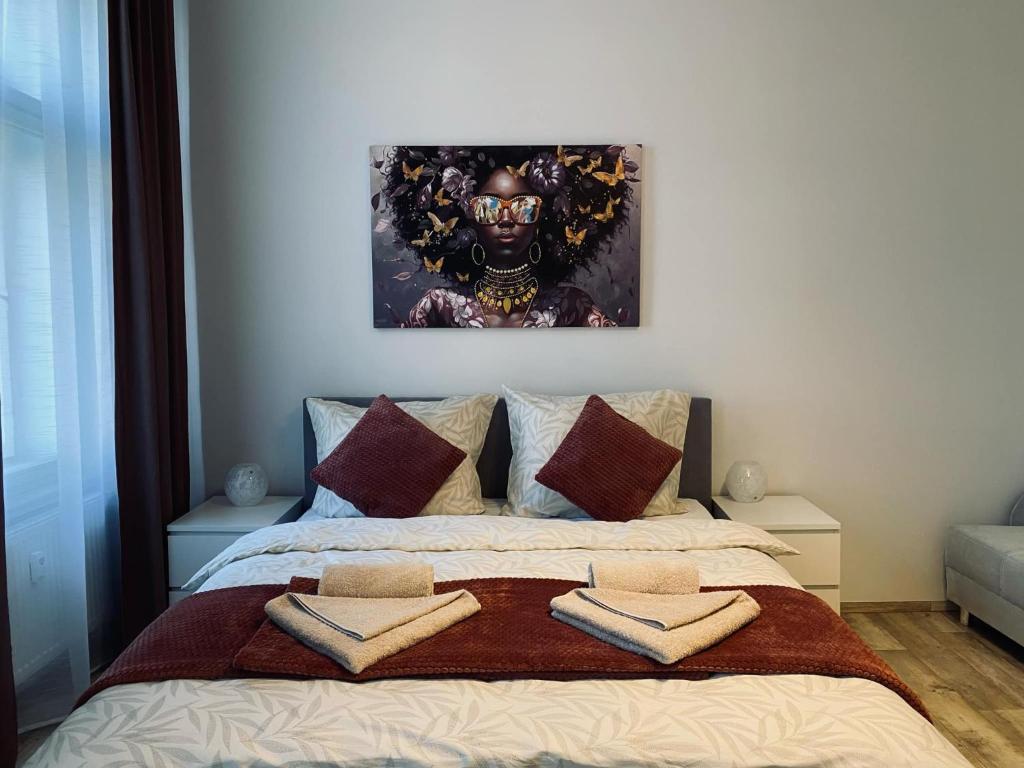 Postel nebo postele na pokoji v ubytování Moderní apartmán vedle divadla - Netflix, Wi-Fi zdarma