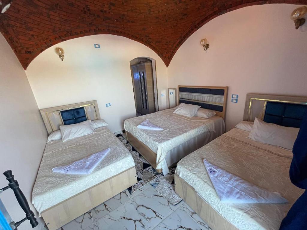 Postel nebo postele na pokoji v ubytování Papy house