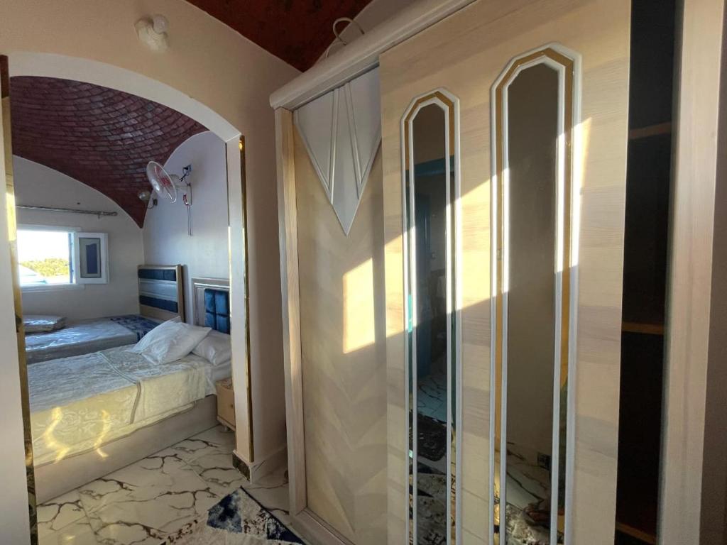 Postel nebo postele na pokoji v ubytování Papy house