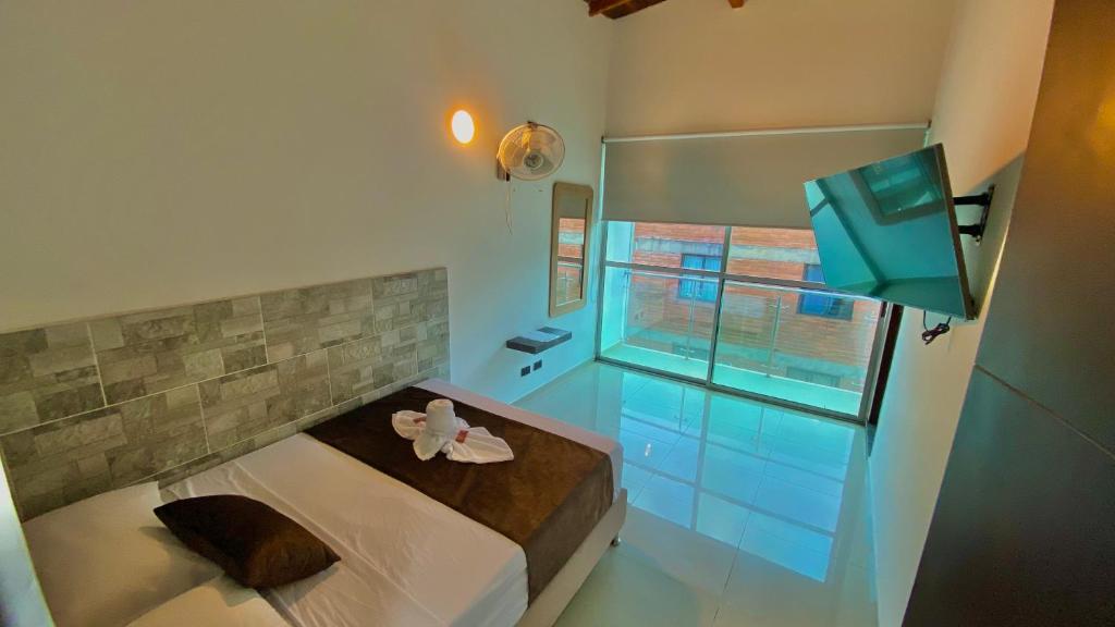 Postel nebo postele na pokoji v ubytování Hotel Buenos Aires Central