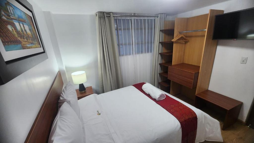 Letto o letti in una camera di INCA PALACE EXPERIENCE Hotel