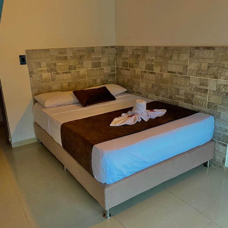 Postel nebo postele na pokoji v ubytování Hotel Buenos Aires Central