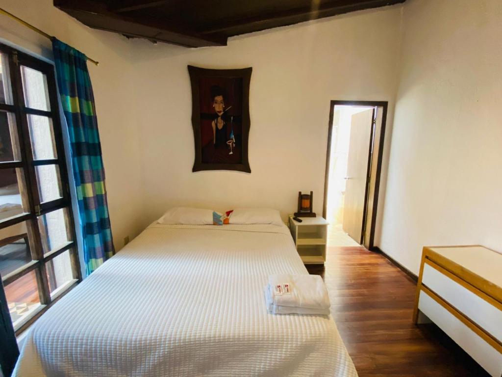 Postel nebo postele na pokoji v ubytování Casa del Arupo