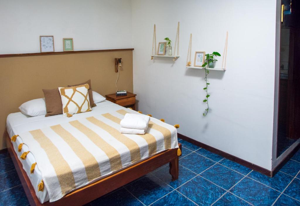 Postel nebo postele na pokoji v ubytování La Posada - Hostel