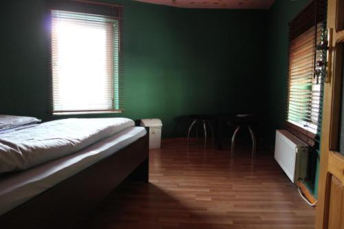 Postel nebo postele na pokoji v ubytování FunHouse