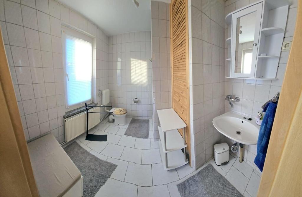 Ein Badezimmer in der Unterkunft Ferienhaus Wiese und Meer
